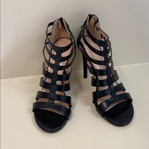 Stewart Weitzman black leather sandals